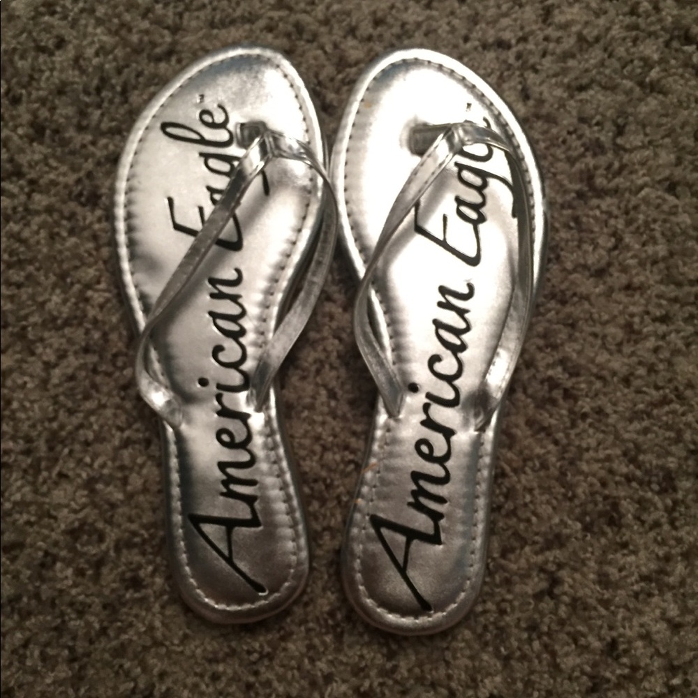 Silver American Eagle size 5 flip flops!